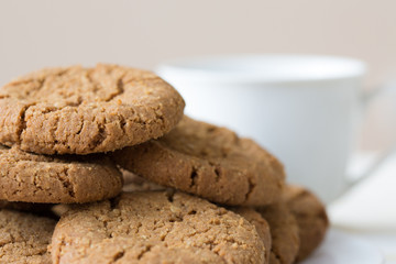 Healthy breakfast with oatmeal cookies or oatcakes and cup of tea or coffee