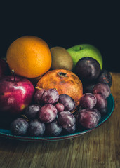 fruit mixture on dark background
