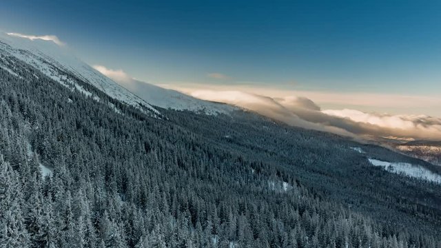 Time lapse clouds over mountain ridge, foehn wind Babia Gora, Poland