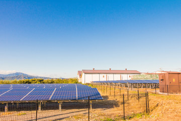 Fototapeta na wymiar Solar power panels ,Photovoltaic modules for innovation green energy for life with blue sky background.