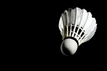 Set Badminton shuttlecock feather professional on isolated black background with text space, copy...