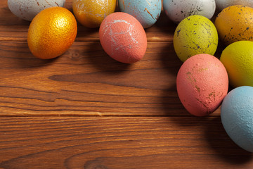 Happy easter! Easter eggs on wooden background