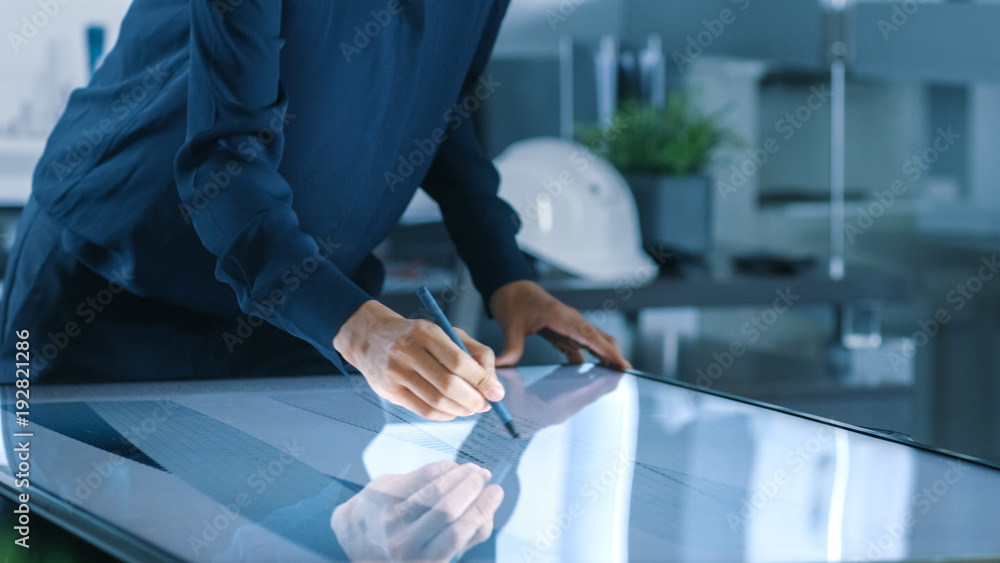 Aufkleber talented young female architectural designer draws building concept on a graphics tablet display ver