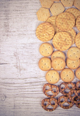 Mix of snacks : pretzels, crackers, cookies.