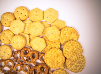 Mix of snacks : pretzels, crackers, cookies.