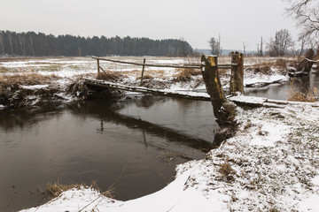 Winter landscape with Jeziorka river near Bogatki village, Masovia, Poland