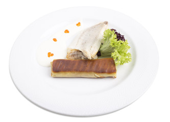 Sea bass fillet with spinach pancake.