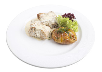 rabbit in white sause with baked potato.