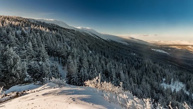 Time lapse clouds over mountain ridge, foehn wind Babia Gora, Poland