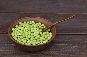 green peas on a dark background