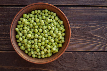 green peas on a dark background