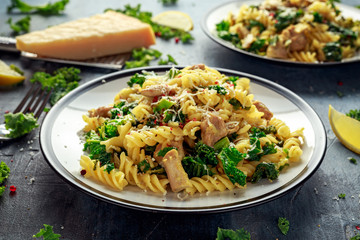 Homemade Pasta fusilli with Chicken, Green Kale, Garlic, lemon and parmesan cheese. healthy home food