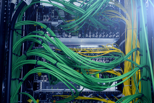 Acoustic audio cable server. Green audio cable. Many acoustic cables. Сoaxial cable for data transmission server. Close up