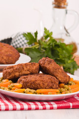 Meatballs on white dish. 