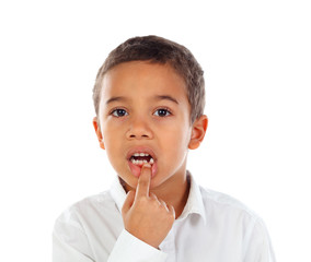Latin child showing his new teeth