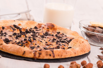 Sweet chocolate pizza with cookies. 
