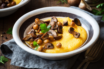 Delicious homemade vegetarian cornmeal polenta with chickpeas and mushrooms