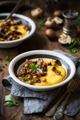 Delicious vegetarian homemade cornmeal polenta with chickpeas and mushrooms