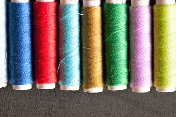 Macro background texture of colorful sewing threads