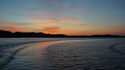 Goodbye Sardinia. After the departure from the port of Golfo Aranci sunset, Sardinia