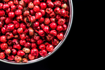Red pepper seeds in pot with copy space