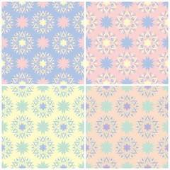 Set of faded colored seamless backgrounds with floral patterns