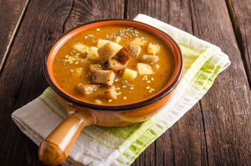 Goulash soup with croutons and potatoes