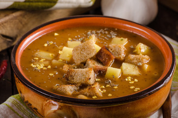 Goulash soup with croutons and potatoes