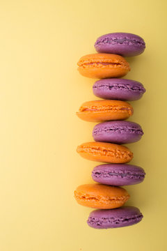 Top view of violet and orange macaron