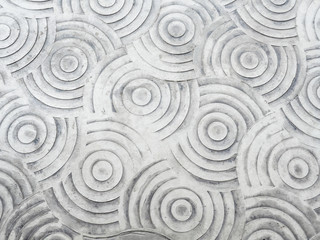 Fototapeta na wymiar Circle graphic pattern on the concrete floor.