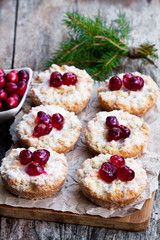 Crumble  topped fruit pies on wooden table. Christmas dessert.