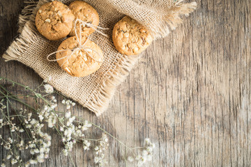 Top view and overhead shot of cookies on old wooden background,Homemade cookies on sackcloth