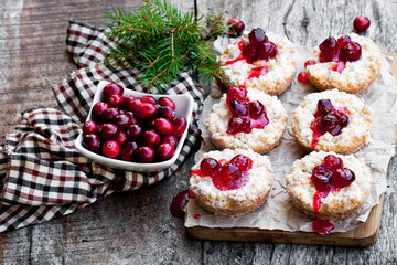 Crumble  topped fruit pies on wooden table. Christmas dessert.
