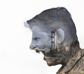Face of an angry, shouting, man in double exposure on the panorama of Izmir (Turkey)