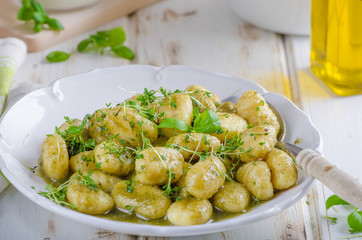 Pesto gnocchi, garlic and fresh herbs olive oil