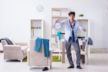 Businessman late for office due to oversleeping after overnight working