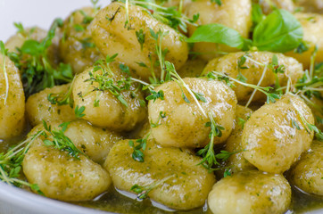 Pesto gnocchi, garlic and fresh herbs olive oil