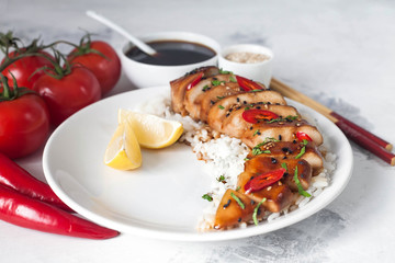 Chicken breast in teriyaki sauce with rice and vegetables