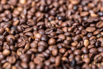 Fototapeta premium fried coffee beans. coffee beans, on a wooden background