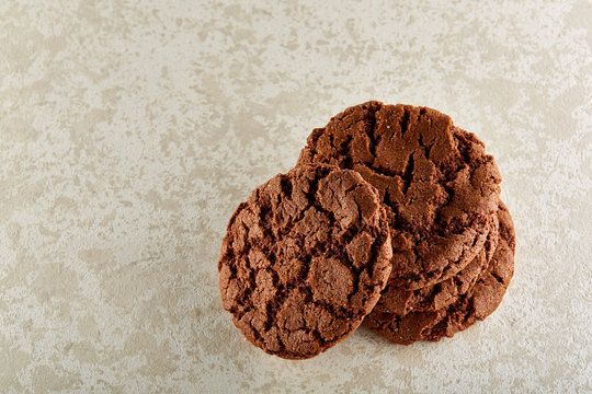 Chocolate chips cookies isolated on light background, macro, close-up
