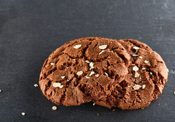 Chocolate chips cookies isolated on black background, macro, close-up