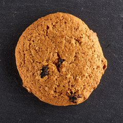 Chocolate chips cookies isolated on black background, macro, close-up
