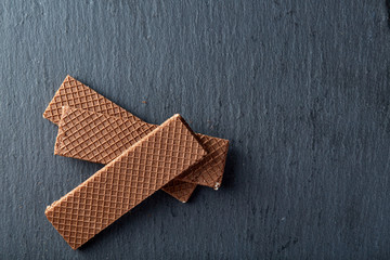 Waffles on a dark greyish marble background