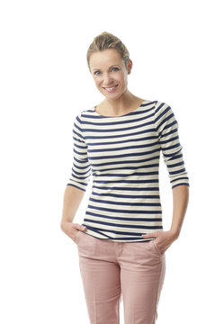 Happy Middle Aged Woman Standing At White Background