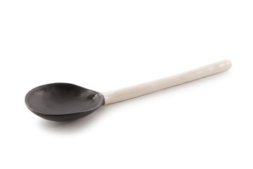 Black and white Ceramic Spoon isolated on a white background
