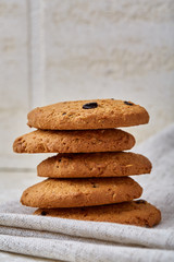 Chocolate chips cookies isolated on light background, macro, close-up, shallow depth of field, selective focus