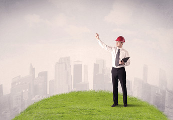 man standing in front of city landscape