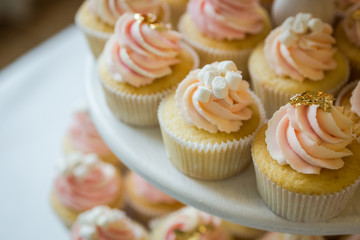 candy bar decorated by delicious sweet buffet with cupcakes and other desserts/candies,happy birthday concept