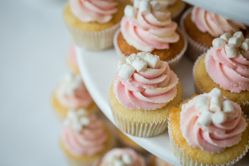 candy bar decorated by delicious sweet buffet with cupcakes and other desserts/candies,happy birthday concept