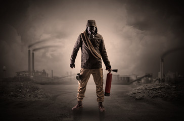 Gas masked men in demolished environment